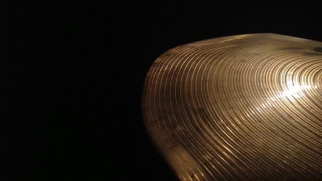 Close up of a crash cymbal as it is performed