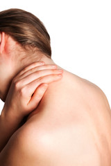 Rear view of a women holding her neck in pain. isolated on white background. monochrome photo with red as a symbol for the hardening. Health concept