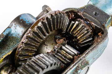 Toothed gear in carpentry tools. An old hand drill for drilling holes in wood and metal.