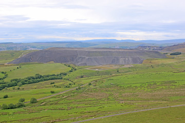 Welsh hills by a coal mine slag heap