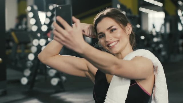 Close up portrait of pretty girl in gym