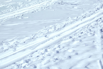 Ski Track. Footprints in the snow. Winter frozen park, lake, river. Concept - healthy lifestyle,...
