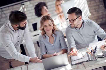 Business people meeting in office to discuss project