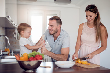 Family  preparing meal with son