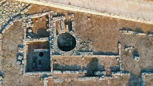 Aerial view half drone ruins archaeological area of the ancient settlement of Egnazia, near Sevelletri, Puglia - Italy