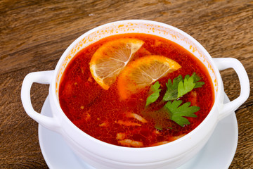 Solyanka soup with lemon