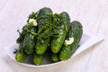Pickled green cucumbers