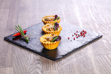 Canape with mushroom and cheese