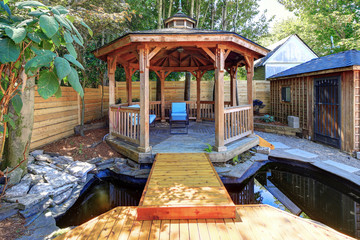 Fabulous gazebo with a pond in the back yard.