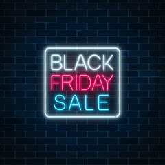 Fototapeta premium Glowing neon sign of black friday sale in rectrangle frame. Seasonal sale web banner. Black friday light signboard