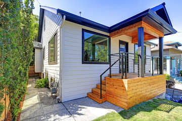 Nice entrance of a renovated house with covered front porch