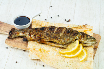 Grilled trout with lemon