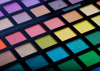 multicolored eye shadows close up
