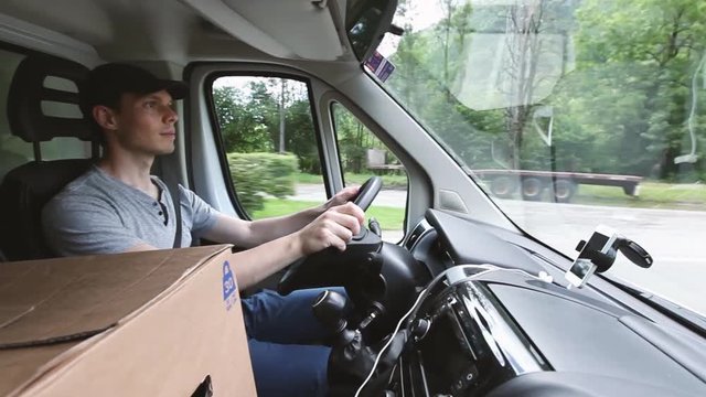 delivery transportation service job, driver man with package box driving truck car vehicle