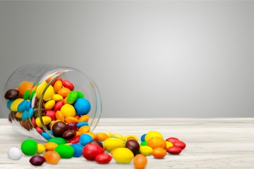 Colorful candies sweets falling out