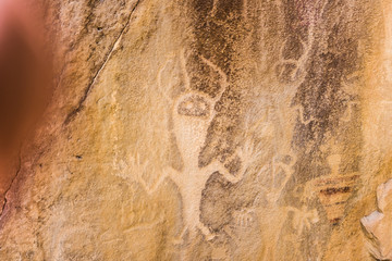 Rock carving of people