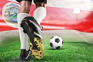 Composite image of close up of football boots