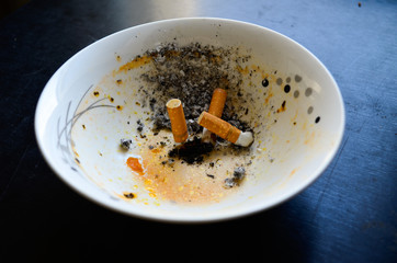 extinguish cigarettes in a bowl
