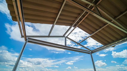 Fototapeta na wymiar Roof Tiles and Blue Sky