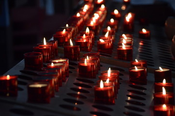 Shiny candles  on a church