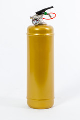 Obraz premium Gold Colored retro fire extinguisher isolated on white background