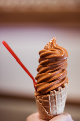 Ice cream cone on hand
