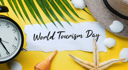 World Tourism Day Typography. Ripped Paper Between Flat Lay Summer Beach Accessories