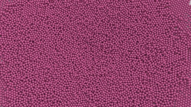 Animated top view of a great amount of fallen and laying in pile plain pink or magenta golf balls. Full 360 degree rotation and loop able.