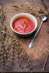 Satsebeli tomato ketchup sauce and paste with red hot chilly pepper, cilantro, garlic, vinegar, spices. Georgian traditional spicy food flavor used in many dishes in Ajaria and Megrelian regions.