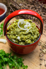 Vegetables green beans pkhali served as salad in bowl. Georgian traditional food snack appetizer. Vegan vegetarian healthy food.