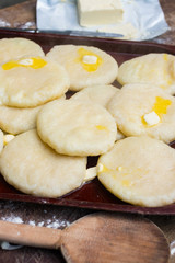 Cooked khachapuri bread with suluguni cheese and butter. Georgian traditional food.