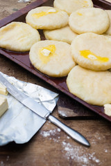 Cooked khachapuri bread with suluguni cheese and butter. Georgian traditional food.