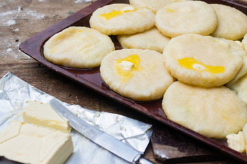 Cooked khachapuri bread with suluguni cheese and butter. Georgian traditional food.