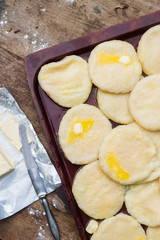Cooked khachapuri bread with suluguni cheese and butter. Georgian traditional food.