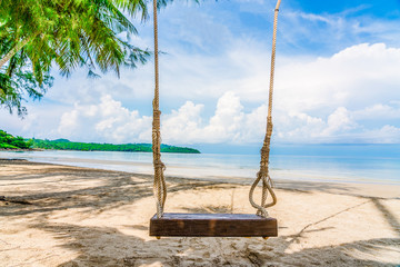 Beautiful Tropical Beach blue ocean background with Traveler items  vacation travel accessories for holiday or long weekend a guide  choice idea for planning travel