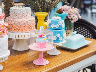 colorful fancy cake on white cakestand