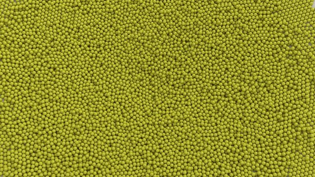 Animated top view of a great amount of fallen and laying in pile plain yellow golf balls. Full 360 degree rotation and loop able.