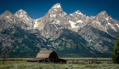 A Mormon barn in the forground of the Tetons in Grand Teton National Park
