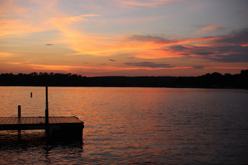 Fototapeta na wymiar Beautiful sky and lake at sunset. Lake Bowen, Inman, SC, USA 