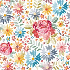 Embroidery floral seamless pattern with different beautiful flowers on white background. Colorful embroidered print with roses, cornflowers and other wildflowers in vector. Fashion design for fabric.