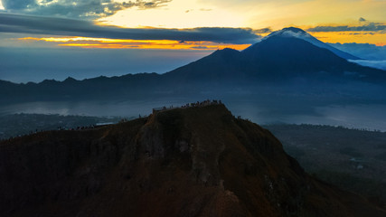 volcano Batur, Bali island, Indonesia. Sunrise, cloudy weather