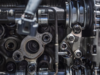 engine closeup parts, valves, bolts