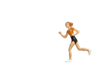 Fototapeta na wymiar Miniature people running isolated on white background with clipping path.