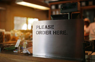 Counter with monitor at restaurant - Please order here.