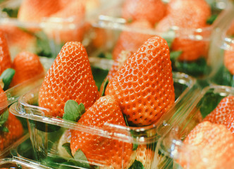 Fresh strawberries placed for sale in supermarkets. Food image.