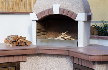 The wood is ready to burn the grill rotisserie. Weekly break