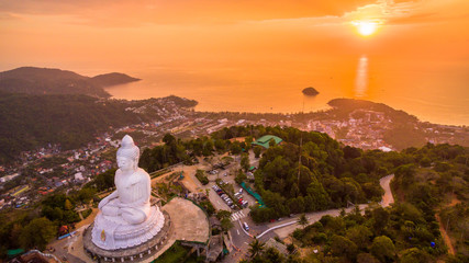 aerial view sweet sunset at Phuket big Buddha. .Phuket Big Buddha statue is one of the island most important and revered landmarks on the island. © Narong Niemhom