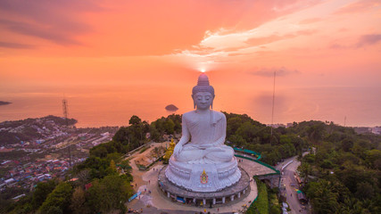 aerial view sweet sunset at Phuket big Buddha. .Phuket Big Buddha statue is one of the island most important and revered landmarks on the island. © Narong Niemhom