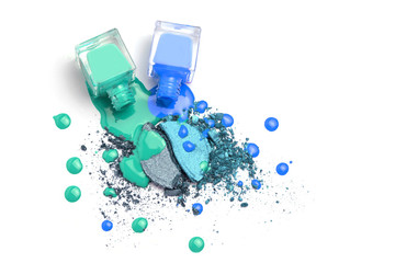 Spilled nail polishes bottles on blue eye shadows cosmetic. Isolated on white.