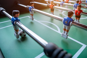 Fototapeta premium Close-up of Table football soccer game on green field